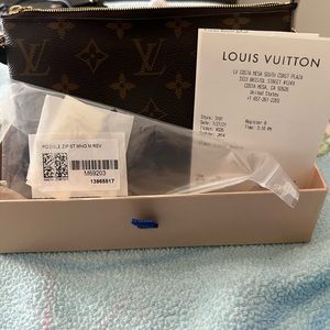 Louis Vuitton double zip Pochette in reverse monogram